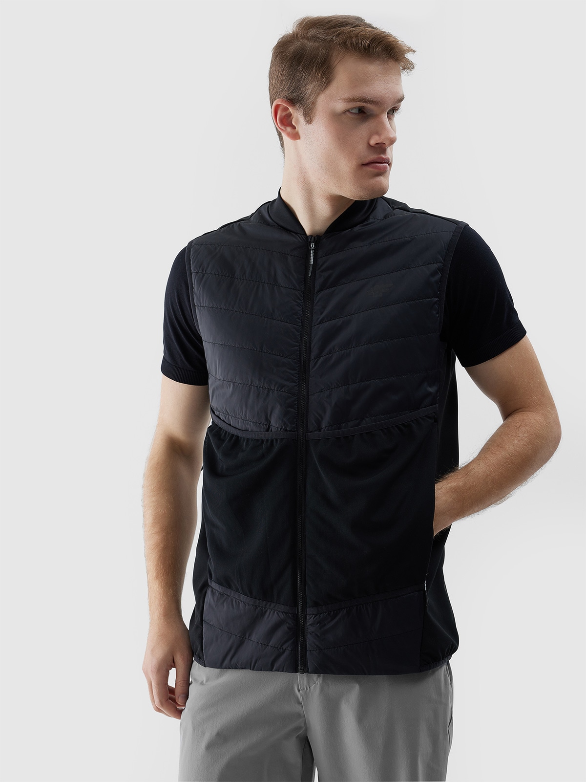Pánska trekingová zatepľovacia vesta s výplňou PrimaLoft Black Eco - čierna